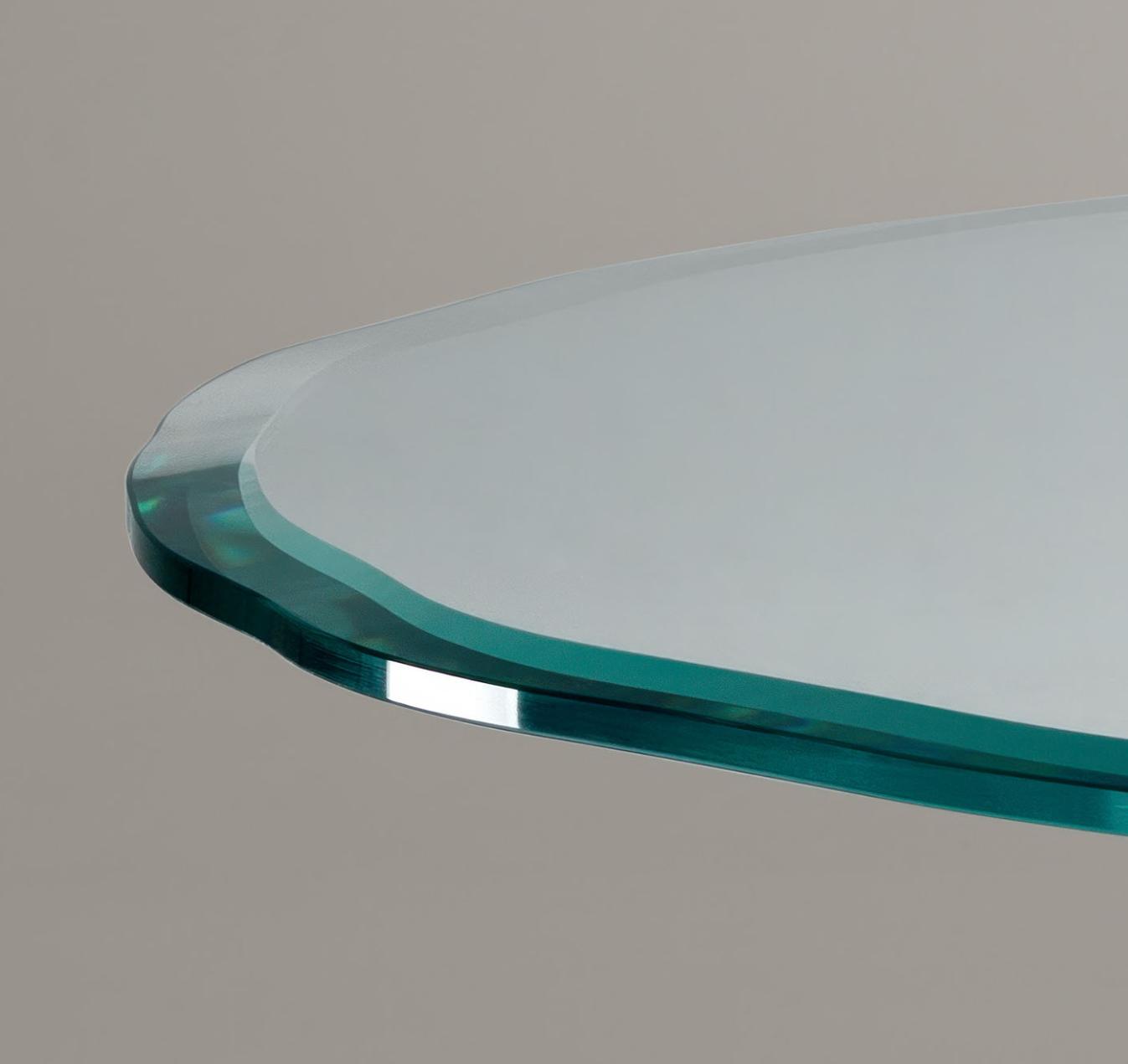 Table de salle à manger ronde en verre avec pieds sculpturaux