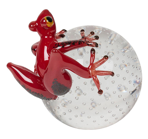 Figurine grenouille rouge sur sphère