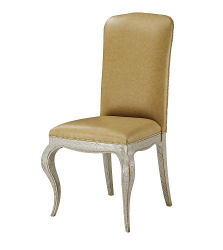 Chaise tapissée en cuir beige
