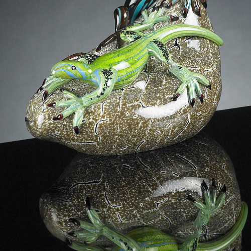 Sculpture lézards sur pierre